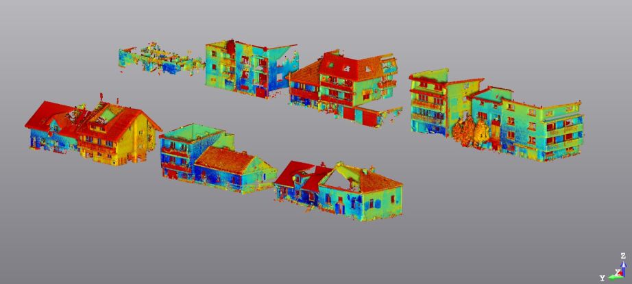 Rys.8 Widok ogólny różnicowego pomiaru odkształceń budynków zlokalizowanych po dwóch stronach przebudowywanej drogi wykonanego laserem 3D